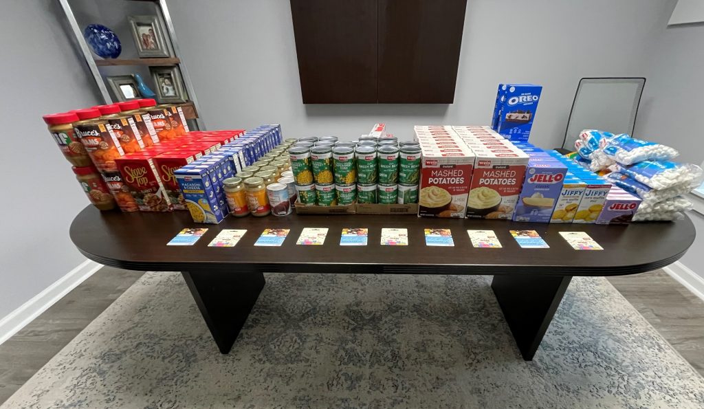 Table filled with Thanksgiving food items.